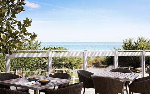 the view of an outside patio on a sunny day.