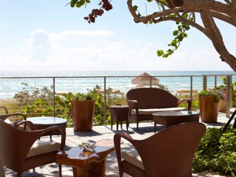 Furniture and an ocean view at the Seagrape Terrace